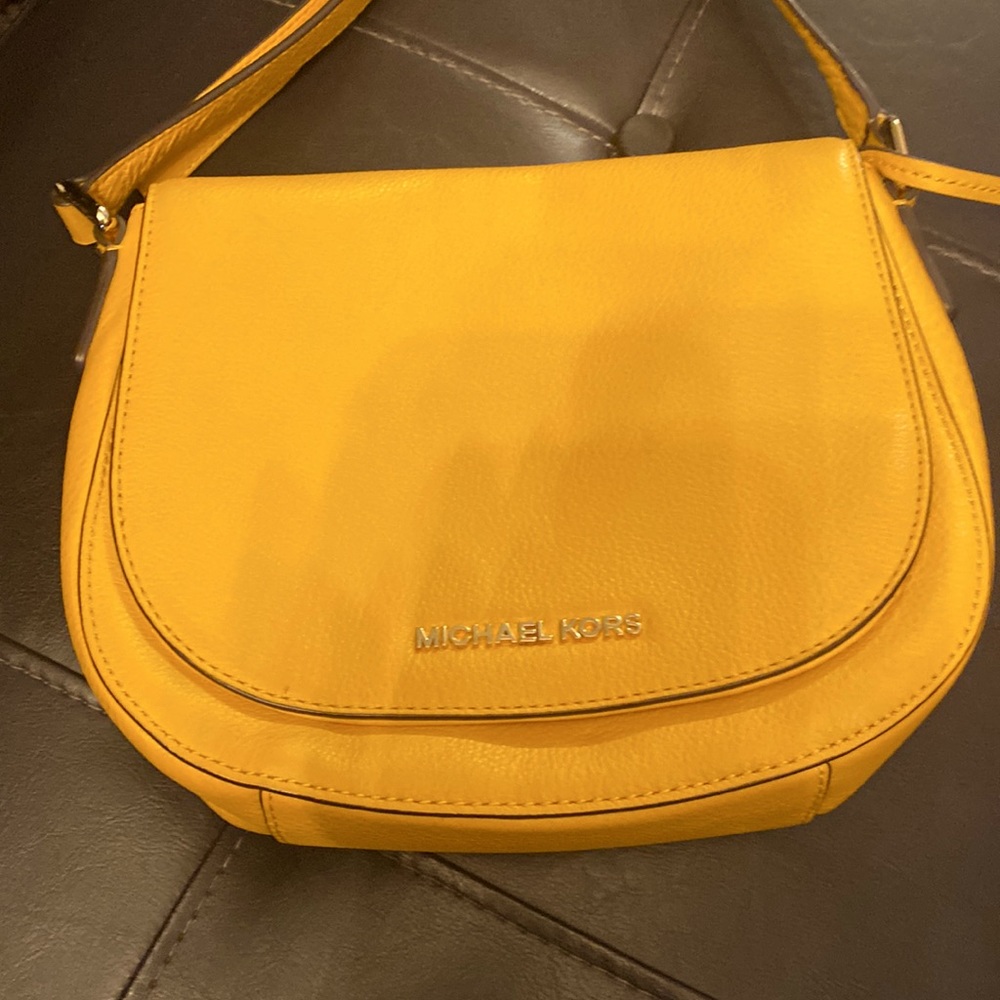 Yellow purse practically new only worn 3 times clean no marks on purse